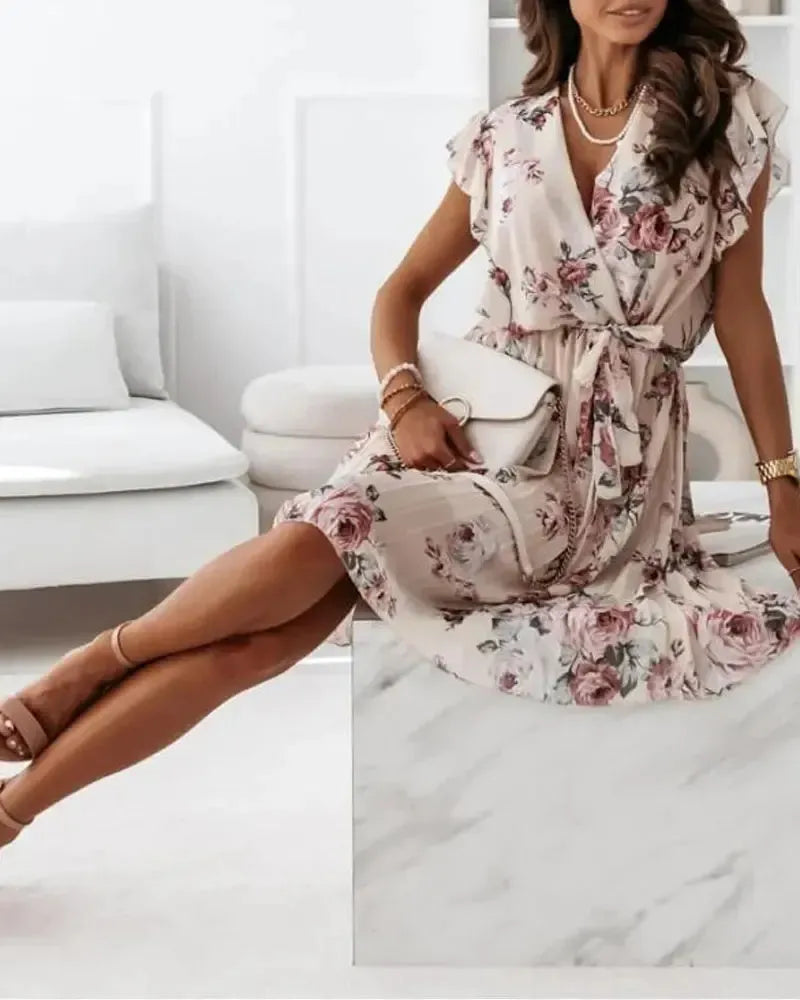 Margaret - Robe portefeuille plissée à imprimé floral ceinturée