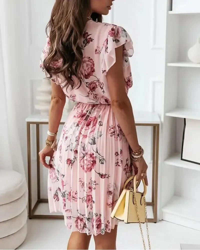 Margaret - Robe portefeuille plissée à imprimé floral ceinturée