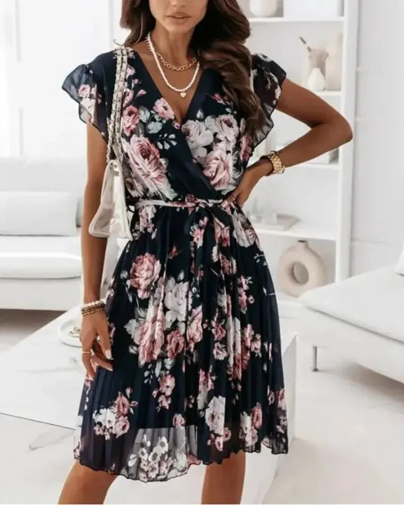 Margaret - Robe portefeuille plissée à imprimé floral ceinturée