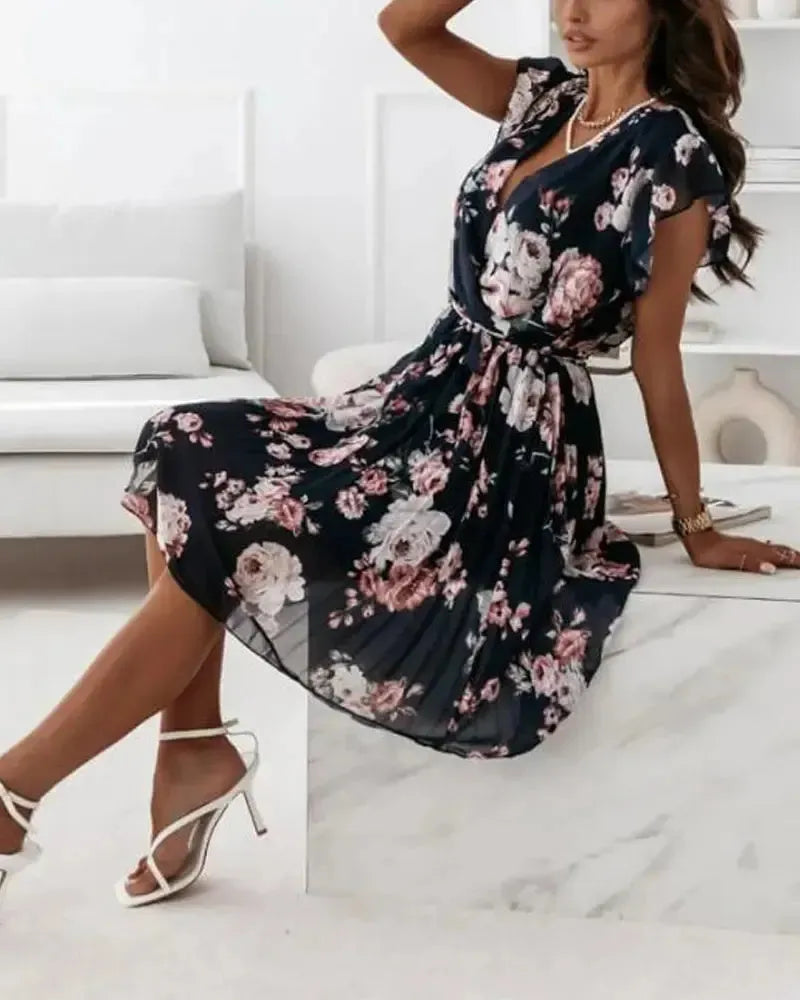 Margaret - Robe portefeuille plissée à imprimé floral ceinturée