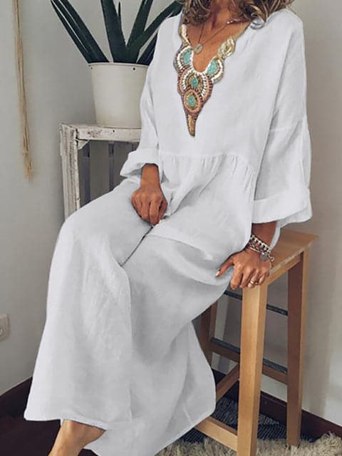 Nina - Robe longue élégante avec décolleté ornementé