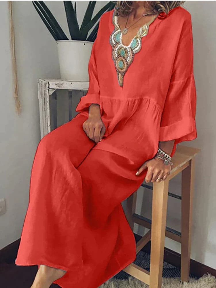 Nina - Robe longue élégante avec décolleté ornementé