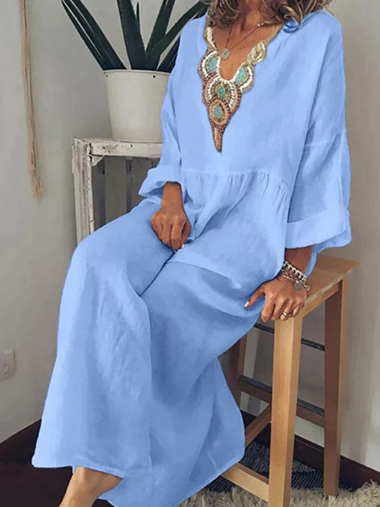 Nina - Robe longue élégante avec décolleté ornementé