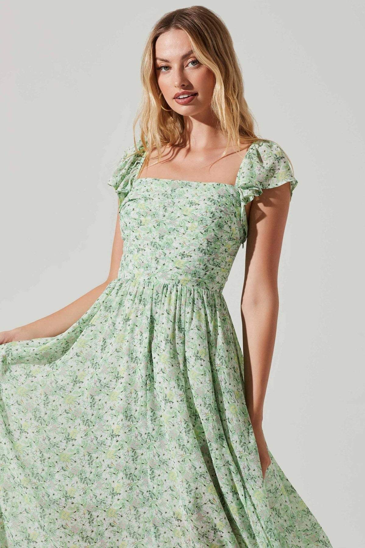 Léane | Robe Midi avec Motifs Floraux et Silhouette Élégante pour Femmes